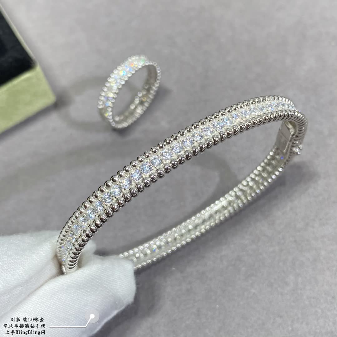 Van Cleef & Arpels Silver Diamante Flower Bangle Set